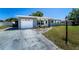 Charming single story home with a well-maintained front yard and a single car garage at 1199 Galgano Ave, Deltona, FL 32725