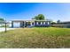 Charming single story home with a well-maintained front yard and a single car garage at 1199 Galgano Ave, Deltona, FL 32725