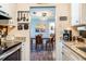 Open kitchen area with a dining room view for easy entertaining at 1199 Galgano Ave, Deltona, FL 32725