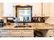 Bright kitchen with granite countertops and white cabinets at 1199 Galgano Ave, Deltona, FL 32725
