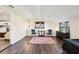 Bedroom with a sitting area, desk, and view to the kitchen at 1265 Aquarius Ave, Deland, FL 32724