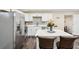 Bright kitchen featuring white cabinets, quartz countertops, and stainless steel appliances at 1265 Aquarius Ave, Deland, FL 32724