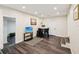 Living area features a TV, table, and a door to the outside at 1265 Aquarius Ave, Deland, FL 32724