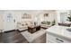 Bright and airy living room featuring stylish decor and hardwood floors at 1265 Aquarius Ave, Deland, FL 32724