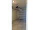 Clean, empty one car garage with an automatic door and cinder block walls at 131 Reena Dr, Daytona Beach, FL 32117