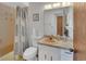 Bathroom featuring a sink, toilet, and bathtub with classic vintage design at 1320 Bakersfield Ave, Deltona, FL 32725