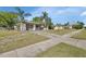 A charming single-story home is showcased with a well-maintained front yard and inviting curb appeal at 1320 Bakersfield Ave, Deltona, FL 32725