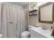 Cozy bathroom with shower curtain, vanity and mirror at 1340 Babcock Ave, Deltona, FL 32725