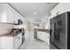 Modern kitchen with stainless steel appliances, sleek cabinetry, and ample counter space at 1340 Babcock Ave, Deltona, FL 32725