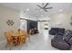 Bright living space featuring tile flooring, a dining area, and comfortable furnishings at 1340 Babcock Ave, Deltona, FL 32725