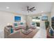Bright living room featuring tile floors, neutral walls and contemporary furniture at 1340 Babcock Ave, Deltona, FL 32725