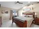 Main bedroom featuring vaulted ceilings, stylish decor and sliding glass doors at 1340 Babcock Ave, Deltona, FL 32725