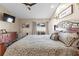 Large main bedroom with king bed, ceiling fan and backyard views at 1340 Babcock Ave, Deltona, FL 32725