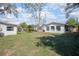 Spacious backyard with lush grass, perfect for outdoor activities and relaxation at 140 E Faith Ter, Maitland, FL 32751
