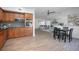 Updated kitchen with stainless steel appliances, wood cabinets, and an open layout at 140 E Faith Ter, Maitland, FL 32751