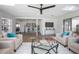 Bright living space with skylight, comfortable seating, wood flooring, and open layout at 140 E Faith Ter, Maitland, FL 32751