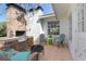 Outdoor patio featuring an outdoor fireplace and comfortable seating area at 140 E Faith Ter, Maitland, FL 32751