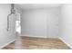 A simple, spacious room with new floors and clean white walls at 140 E Faith Ter, Maitland, FL 32751