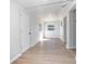 A bright and spacious hallway with new floors and white walls at 140 E Faith Ter, Maitland, FL 32751