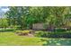 Well-maintained Halifax Plantation community sign with brick accents, lush greenery, and manicured landscaping at 1422 Carlow Cir, Ormond Beach, FL 32174