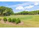 Beautiful view of the golf course showcasing the green and well-maintained landscaping at 1422 Carlow Cir, Ormond Beach, FL 32174