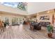 Spacious lobby features high ceilings, comfortable seating, and large windows offering natural light and scenic views at 1422 Carlow Cir, Ormond Beach, FL 32174