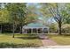 Picturesque outdoor pavilion area with benches, set amongst mature trees at 1422 Carlow Cir, Ormond Beach, FL 32174