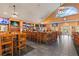 Inviting restaurant boasts a full bar, multiple TVs, and ample seating, perfect for socializing at 1422 Carlow Cir, Ormond Beach, FL 32174