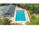 Community swimming pool features clean, clear water with lounge chairs and recreational space for residents at 1422 Carlow Cir, Ormond Beach, FL 32174
