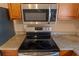 Updated kitchen showcasing granite countertops and stainless steel appliances at 1430 17Th St, Orange City, FL 32763