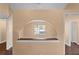 Living room featuring an arched opening and a built in shelf at 1430 17Th St, Orange City, FL 32763