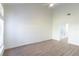 Large bedroom with vaulted ceiling, wood floors, and ensuite bathroom at 1465 Farrindon Cir # 1465, Lake Mary, FL 32746