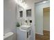 Bathroom featuring white sink basin with modern fixtures at 1533 Legend Ct, Deltona, FL 32738