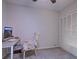 Bedroom features a comfortable chair near a desk with a view at 1533 Legend Ct, Deltona, FL 32738