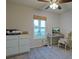 Bright bedroom with natural light showcasing desk and workstation at 1533 Legend Ct, Deltona, FL 32738