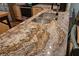 Close up of kitchen counter with beautiful, unique granite countertops at 1533 Legend Ct, Deltona, FL 32738