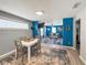 Open dining area with modern decor and stylish furniture flowing into the living room at 1551 7Th Ave, Deland, FL 32724