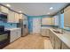 Spacious kitchen with updated cabinets, stainless steel appliances, and ample counter space at 1551 7Th Ave, Deland, FL 32724
