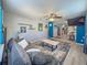 Open living space with hardwood floors and stylish decor, seamlessly connects to the kitchen at 1551 7Th Ave, Deland, FL 32724