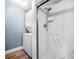 A remodeled bathroom features a tiled shower and convenient washer and dryer at 171 Moonstone Ct, Port Orange, FL 32129