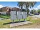 Townhome complex mailboxes with lush lawn and mature trees at 171 Moonstone Ct, Port Orange, FL 32129
