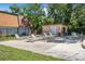 Community pool area featuring lounge chairs and shade, ideal for relaxation and social gathering at 171 Moonstone Ct, Port Orange, FL 32129