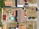Aerial view of property, showcasing the backyard, pool, and landscaping at 1767 Valencia Ave, Ormond Beach, FL 32174