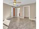 Spacious bedroom featuring vinyl floors, neutral walls, and a ceiling fan at 1877 N Merrick Dr # 0, Deltona, FL 32738