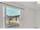Bedroom featuring a large window that offers backyard views and natural light at 1877 N Merrick Dr # 0, Deltona, FL 32738