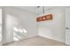 Bright and airy bedroom with light walls and tile floors and overhead storage at 1877 N Merrick Dr # 0, Deltona, FL 32738