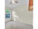 Bright bedroom with tile floors and a sunny window at 1877 N Merrick Dr # 0, Deltona, FL 32738