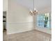 Bright dining room featuring tile floors, neutral walls and a large window at 1877 N Merrick Dr # 0, Deltona, FL 32738
