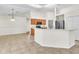 Modern kitchen with stainless steel appliances, wood cabinets, tile floors and eat in bar at 1877 N Merrick Dr # 0, Deltona, FL 32738