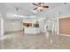 Open-concept living room features tile floors and is connected to the modern kitchen at 1877 N Merrick Dr # 0, Deltona, FL 32738